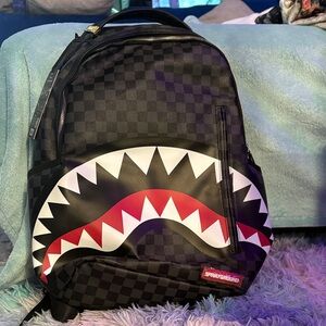 Sprayground Checkered Black and Red Shark Backpack